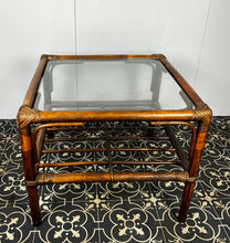 Load image into Gallery viewer, Stunning intertwined woven corners with magnificent craftsmanship finish towards the bottom of a bamboo rack to store books or newspapers come with a sleek glass top.