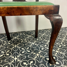 Load image into Gallery viewer, The mahogany chair with shaped backrest has a beautifully shaped finish with a piercing splat with a harp design, drop-in seats in a nice green tone leather type material, with one minor scuff and the padding, had fallen it, on lovely cabriole legs