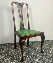 Load image into Gallery viewer, The mahogany chair with shaped backrest has a beautifully shaped finish with a piercing splat with a harp design, drop-in seats in a nice green tone leather type material, with one minor scuff and the padding, had fallen it, on lovely cabriole legs
