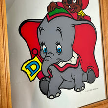 Load image into Gallery viewer, Stunning vintage Disney Dumbo mirror featuring the famous elephant and Timothy the mouse in beautiful vivid tones in bright stand out colours to make and impact in any Disney collectors home or children room.