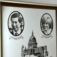 Load image into Gallery viewer, Vibrant mirror featuring the wedding of Charles and Diana on the 29th of July 1981 with a portrait of the couple and intricate picture of St Pauls and the fonts in a banner design.