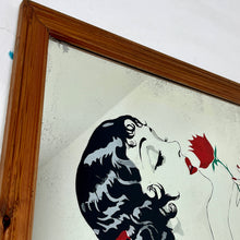 Load image into Gallery viewer, Glamorous lady nude art deco mirror with stunning details with her robe sliding down her body, holding her roses in vivid red tones with highlights on her lips, nails, hair clip and ring with the matching colour, intricate picture with superb design,
