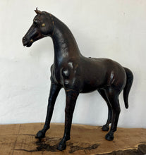 Load image into Gallery viewer, This fine late 19th Century piece has fabulous form with detailed design showing the precision of crafting the mane, the hoofs and the detail of the ears and the face, casting the muscle definition to show the realistic appearance of the piece.