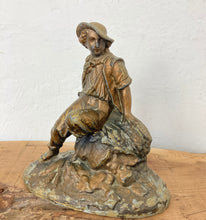Load image into Gallery viewer, Wonderful late 19th-century antique gilded spelter material figurine with a copper finish featuring a majestic chap sitting upon a haystack with a scythe in his left hand and a cut a piece of hay that he had been working on