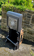 Load image into Gallery viewer, Beautiful antique Victorian Art Nouveau fireplace. Elegant design in cast iron with pewter insert and beautiful stylised sinuous floral copper decorations.