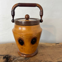 Load image into Gallery viewer, This wonderful vintage-turned wood caddy, with an attractive lid and handle, has a natural wood finish in the design, charming grain, and excellent craftsmanship. It is an elegant and functional addition to your home decor.