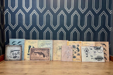 Load image into Gallery viewer, A selection of eleven gun and revolver art pictures with stunning deals created in a vintage style and printed on old wooden sheets likely to be developed in the 90s