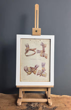 Load image into Gallery viewer, This is a vintage original poster on a card depicting medical and military content from Eastern Europe. It shows diagrams of the tourniquet method and provides instructions on usage.