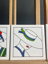 Load image into Gallery viewer, This exquisite piece showcases a beautiful art deco design that captivates the eye, featuring four glamorous women adorned in stunning detail. The vibrant colours of the glaze bring their flowing hair and exquisite hats to life.