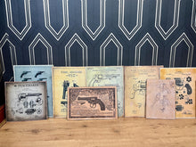 Load image into Gallery viewer, A selection of eleven gun and revolver art pictures with stunning deals created in a vintage style and printed on old wooden sheets likely to be developed in the 90s