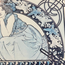 Load image into Gallery viewer, This vintage art nouveau wooden wall plaque, with a blue effect, is a unique piece of art. It features an elegant lady wearing an attractive headdress, her hair tied up, and a selection of glamorous clothing.