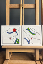 Load image into Gallery viewer, This exquisite piece showcases a beautiful art deco design that captivates the eye, featuring four glamorous women adorned in stunning detail. The vibrant colours of the glaze bring their flowing hair and exquisite hats to life.