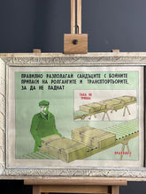 Load image into Gallery viewer, This striking image showcases a dedicated worker in an ammunition loading factory, meticulously engaged in the shell manufacturing process. The poster features a stylish finish, adding an artistic flair to its historical significance.