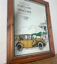 Load image into Gallery viewer, Wonderful vintage automobile mirror featuring an prestige car in mustard tones with the driver and the well dressed couple in the back, bird watching and mountainous background with a selection on people and intricate building.