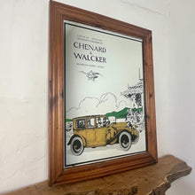 Load image into Gallery viewer, Wonderful vintage automobile mirror featuring an prestige car in mustard tones with the driver and the well dressed couple in the back, bird watching and mountainous background with a selection on people and intricate building.