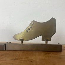 Load image into Gallery viewer, Superb WW1 Trench Art Crafted Lady Shoes Bookends. These were bought as part of a military collection and have been handcrafted from hammered brass, which was produced from a shell casing.