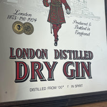 Load image into Gallery viewer, The stunning design features the famous London gin brand in vivid red fonts, a vibrant gold background, and a picture of the familiar logo on the King Body Guard of the Yeomen of the Guard (Beefeater).