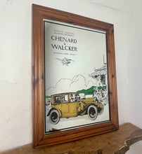 Load image into Gallery viewer, Wonderful vintage automobile mirror featuring an prestige car in mustard tones with the driver and the well dressed couple in the back, bird watching and mountainous background with a selection on people and intricate building.