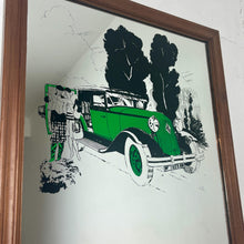 Load image into Gallery viewer, A Stylish Renault advertising mirror features a classic car with stand-out green detail. The couple wears elegant clothing and looks at their map against a woodland noir background.
