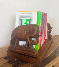 Load image into Gallery viewer, Mid-century vintage bookends extend out with stylish carved elephants with fold-down hinges.