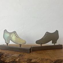 Load image into Gallery viewer, Superb WW1 Trench Art Crafted Lady Shoes Bookends. These were bought as part of a military collection and have been handcrafted from hammered brass, which was produced from a shell casing.