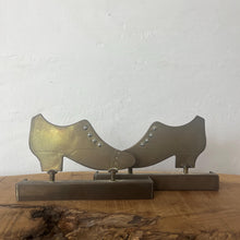 Load image into Gallery viewer, Superb WW1 Trench Art Crafted Lady Shoes Bookends. These were bought as part of a military collection and have been handcrafted from hammered brass, which was produced from a shell casing.