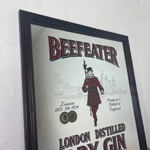 Load image into Gallery viewer, The stunning design features the famous London gin brand in vivid red fonts, a vibrant gold background, and a picture of the familiar logo on the King Body Guard of the Yeomen of the Guard (Beefeater).