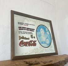 Load image into Gallery viewer, This is an excellent vintage Coca-Cola advertising mirror featuring a large picture of a lady dressed in Victorian-style attire
