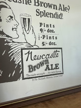 Load image into Gallery viewer, Vibrant Newcastle brown ale mirror with stand out fonts with great picture with a man enjoying his beer, fantastic slogan and interesting information about the prices, with further unique branding information a very stylish piece.
