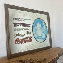 Load image into Gallery viewer, This is an excellent vintage Coca-Cola advertising mirror featuring a large picture of a lady dressed in Victorian-style attire