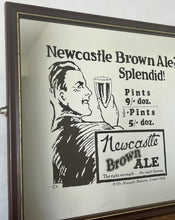 Load image into Gallery viewer, Vibrant Newcastle brown ale mirror with stand out fonts with great picture with a man enjoying his beer, fantastic slogan and interesting information about the prices, with further unique branding information a very stylish piece.