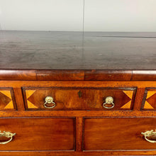 Load image into Gallery viewer, This is a classic late Georgian, mahogany, English chest of drawers dating to early c.1800.This large chest has seven drawers: three small drawers, two medium drawers, and two full-length drawers. It offers generous storage in an elegant and practical form.