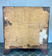 Load image into Gallery viewer, The antique mahogany bureau has a fall front that opens to reveal a writing surface. Its elegant fitted interior consists of six pigeon holes, five drawers on either side, and a central cupboard with Roman columns with a gold detail sitting on desirable runners