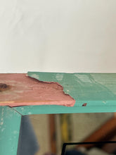 Load image into Gallery viewer, A collectible advertising piece featuring a glamorous lady in a vintage-style scarf bandana with her ribbon flowing down, posing thoughtfully. The mirror has a stylish feel and a noir finish with hint if colour. It is an excellent wall art piece to add a nice touch to your home.