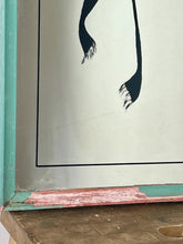 Load image into Gallery viewer, A collectible advertising piece featuring a glamorous lady in a vintage-style scarf bandana with her ribbon flowing down, posing thoughtfully. The mirror has a stylish feel and a noir finish with hint if colour. It is an excellent wall art piece to add a nice touch to your home.