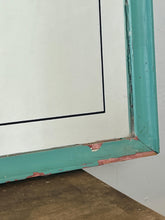 Load image into Gallery viewer, A collectible advertising piece featuring a glamorous lady in a vintage-style scarf bandana with her ribbon flowing down, posing thoughtfully. The mirror has a stylish feel and a noir finish with hint if colour. It is an excellent wall art piece to add a nice touch to your home.