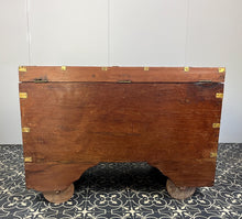 Load image into Gallery viewer, A beautiful Anglo-Indian Marriage Dowry chest circa 1900 with campaign handles and original wooden wheels, a very well-crafted and decorative chest, decorated with brass inlaid wire work, classically indicative of Indian artistry. This piece is a fine example of an Anglo-Indian chest. Designed as a dowry piece to be given by the father of the bride in an Indian wedding, you would have gold, jewellery, land deeds, money and fine linens stored inside.