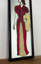 Load image into Gallery viewer, The mirror's design, characterised by the elegant lines of the woman's figure and attire, is indicative of the Art Deco era, which flourished in the 1920s and 1930s and is known for its glamorous and sophisticated aesthetic.