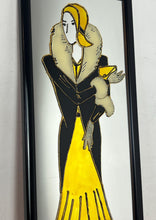 Load image into Gallery viewer, The mirror's design, characterised by the elegant lines of the woman's figure and attire, is indicative of the Art Deco era, which flourished in the 1920s and 1930s and is known for its glamorous and sophisticated aesthetic
