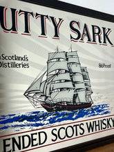 Load image into Gallery viewer, The mirror features the iconic image of the Cutty Sark clipper ship, a renowned tea clipper launched in 1869, which inspired the whisky's name. It also states "From Scotland's best Distilleries" and "86 Proof" (which translates to 43% ABV).