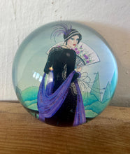 Load image into Gallery viewer, Vintage Art Deco style glass paperweight featuring an illustration of a woman, often referred to as a "flapper lady" or "Gatsby lady" due to the 1920s aesthetic.