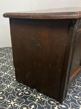 Load image into Gallery viewer, The antique oak coffer is of simple, plain form and has a hinged lid that opens to reveal a spacious interior. The coffer has a three-panel front and is raised on block feet. One of my favourite parts is the back panel that has been crudely chiselled from one section of oak, with an excellent, authentic craftsmanship finish.