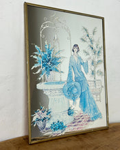 Load image into Gallery viewer, Beautiful Art Nouveau lady mirror featuring a glamorous lady with an elegant blue dress and hat with a Victorian Manor House background with a fountain, and wonderful matte effect tones.