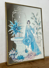 Load image into Gallery viewer, Beautiful Art Nouveau lady mirror featuring a glamorous lady with an elegant blue dress and hat with a Victorian Manor House background with a fountain, and wonderful matte effect tones.