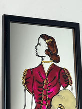 Load image into Gallery viewer, The mirror's design, characterised by the elegant lines of the woman's figure and attire, is indicative of the Art Deco era, which flourished in the 1920s and 1930s and is known for its glamorous and sophisticated aesthetic.