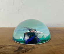 Load image into Gallery viewer, Vintage Art Deco style glass paperweight featuring an illustration of a woman, often referred to as a "flapper lady" or "Gatsby lady" due to the 1920s aesthetic.