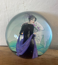 Load image into Gallery viewer, Vintage Art Deco style glass paperweight featuring an illustration of a woman, often referred to as a "flapper lady" or "Gatsby lady" due to the 1920s aesthetic.