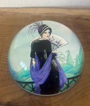 Load image into Gallery viewer, Vintage Art Deco style glass paperweight featuring an illustration of a woman, often referred to as a "flapper lady" or "Gatsby lady" due to the 1920s aesthetic.
