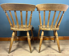 Load image into Gallery viewer, A classic design, featuring a lath back and a pleasingly shaped seat, combined with excellent build craftsmanship. The seat stands on turned legs with a single H-stretcher, making the chairs sturdy.