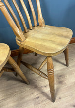 Load image into Gallery viewer, A classic design, featuring a lath back and a pleasingly shaped seat, combined with excellent build craftsmanship. The seat stands on turned legs with a single H-stretcher, making the chairs sturdy.